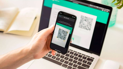 Scaning the QR code displayed on the WhatsApp Web page